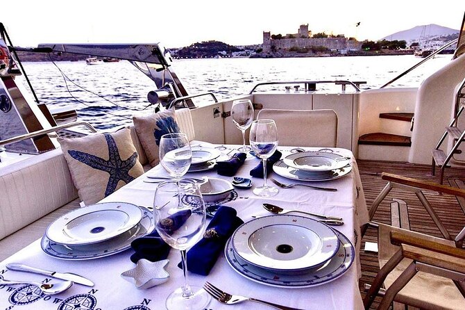 Bodrum Private Motor-Yacht Sunset Tour With Dinner For 3 Hour - Included paddleboard and fishing time: how to use the calm instead of fighting it