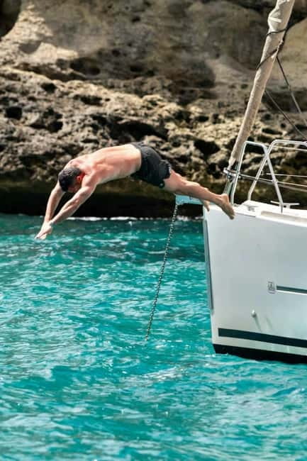 Cagliari: Catamaran Tour, Swimming, Snorkeling, & Prosecco - Prosecco toast and the return to Alma Sailing Charter