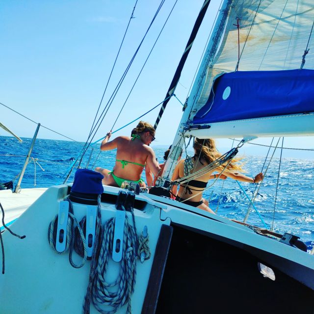 Cagliari Sailing Boat Tour with Snorkeling and Drink - The boat experience: 9 meters, shade, and real sea air