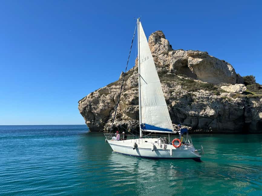 Cagliari Sailing Boat Tour with Snorkeling and Drink - Sailing back toward Poetto: wind, quiet, and finishing strong