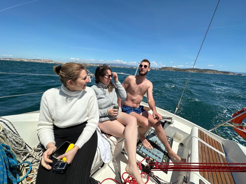 Cagliari: Sailing tour to Devil's Saddle aboard Merak - Devil’s Saddle Stop: Swim in Clear Water Under a White Cliff
