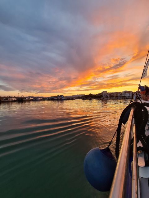 Cambrils: Costa Dorada Sunset Catamaran Cruise with Drinks - The Onboard Setup: Net Bow Relaxation and Space to Breathe