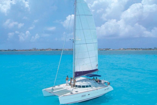 Cancun Half-Day Sailing Catamaran Cruise to Isla Mujeres - Price and Logistics: Dock Fee, Where to Meet, and How the Timing Feels