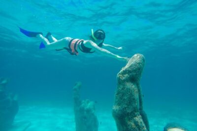 Cancun Half-Day Sailing Catamaran Cruise to Isla Mujeres - Getting Onboard: Party Energy Without Needing a Snorkel Pro