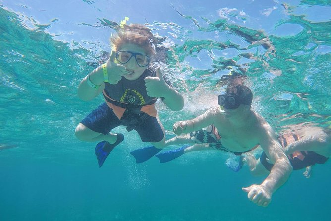 Cancun Half-Day Sailing Catamaran Cruise to Isla Mujeres - On-Water Vibe: Open Bar, Photographer, and Group Size Reality