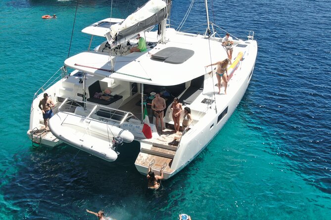 Catamaran Alghero, Catamaran Sailing Day Trip - Meeting the Crew: Captain Max and Alex Set the Tone
