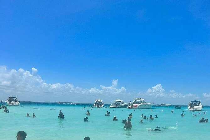 Catamaran Cancun to Isla mujeres Lunch OpenBar and Snorkeling - Playa Norte: Transparent Water, Short Stretches, and Dock Reality