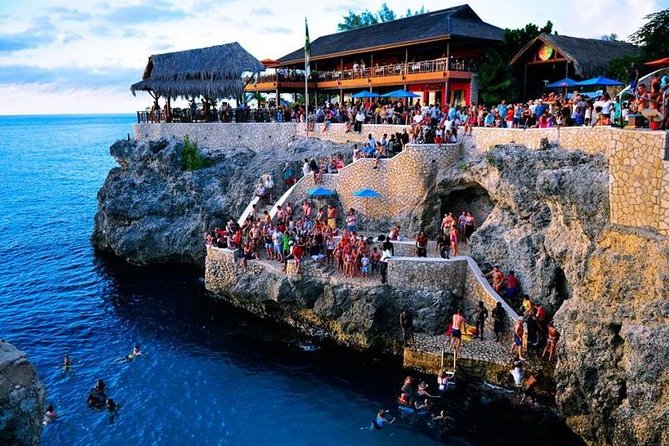 Catamaran Cruise Full Day Tour to Reef, Caves and Negril Beach - The Catamaran Part: Unlimited Drinks, Reggae Music, and Snorkeling Off the Boat