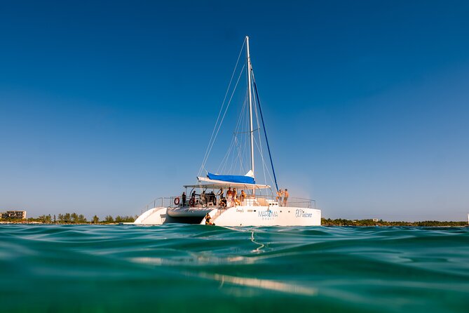 Catamaran Cruise in Riviera Maya With Snorkeling & Beach Club - Catamaran Time From Pickup to Return: What the Day Feels Like