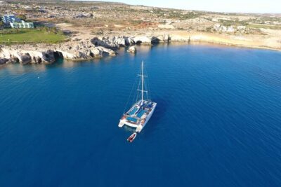 Catamaran Crystal Sea Cruise from Protaras - Entering Green Bay Beach and the Cape Greco Coastline