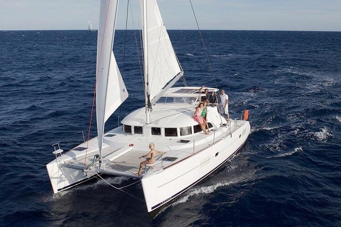 Catamaran Day & Sunset Cruises with meals Drinks and transportation - Sailing Past Mykonos Landmarks: Small Views, Big Payoff