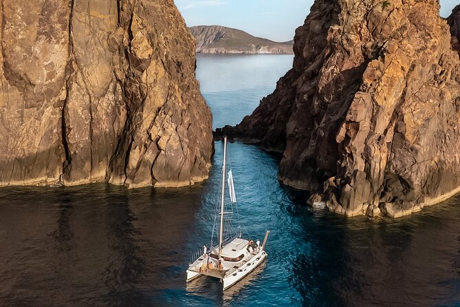 Catamaran Full-Day of Milos and Poliegos With Lunch & BBQ - Kalogries Beach (40 minutes): clear water and a quieter vibe