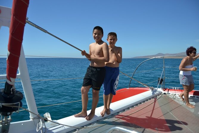 Catamaran Half-Day Cruise from Caleta de Fuste - Lunch at Sea: Paella or Salad, Plus Dessert