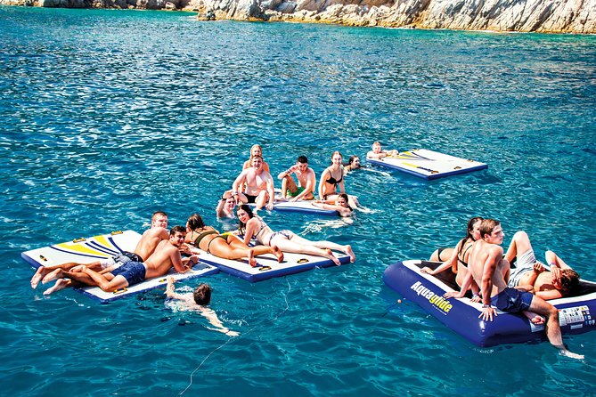 Catamaran ride -Costa Brava with barbecue and drinks. Familiar. - Costa Brava by Catamaran: What This 4-Hour Day Really Delivers