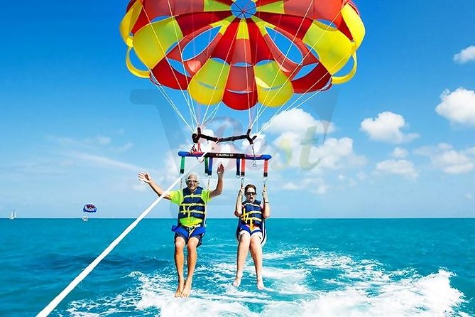 Catamaran to Ile aux Cerf with Parasailing, Tube Riding & Lunch - Parasailing over Mauritius water: the highlight when conditions cooperate