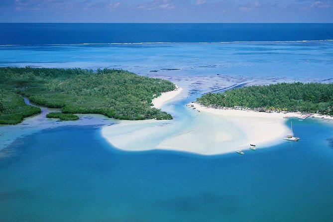 Catamaran to Ile aux Cerf with Parasailing, Tube Riding & Lunch - Tube riding with speedboat tow and banana gears