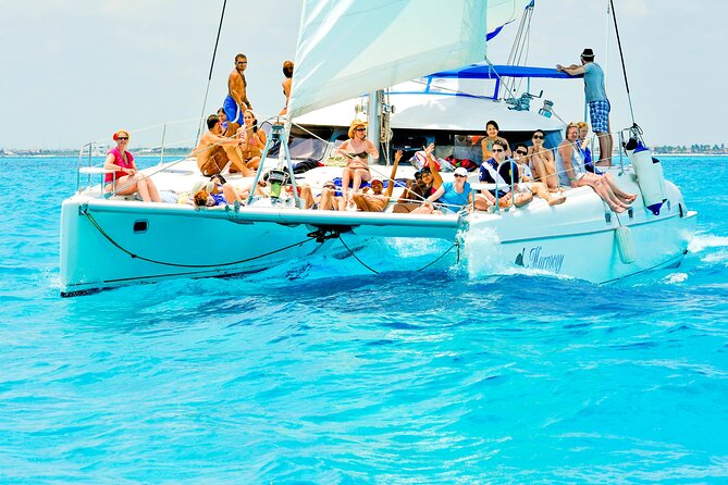 Catamaran to Isla Mujeres Snorkeling Tour with Open Bar and Lunch - The Catamaran Ride: Fun Views, but Expect Crowd Energy