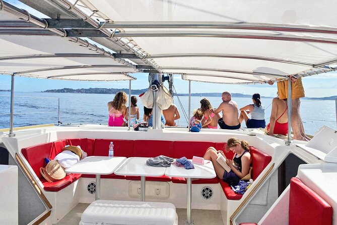 Catamaran tour of the islands of the La Maddalena Archipelago - Passing Cala di Roto Pink Beach without breaking park rules