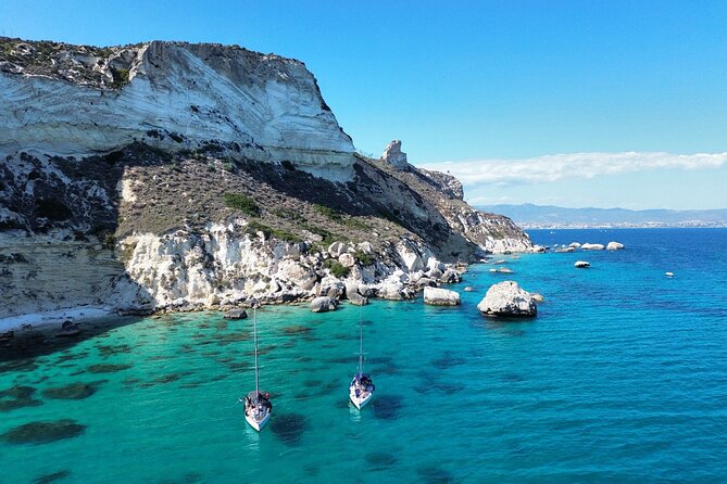 Catamaran tour stops bathing and snorkeling toast with prosecco - A 3-hour sail that breaks you out of Cagliari walking mode