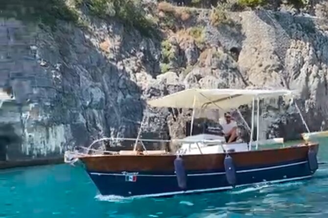 Catamaran tour stops bathing and snorkeling toast with prosecco - Grotta dei colombi: a cave you appreciate from the route