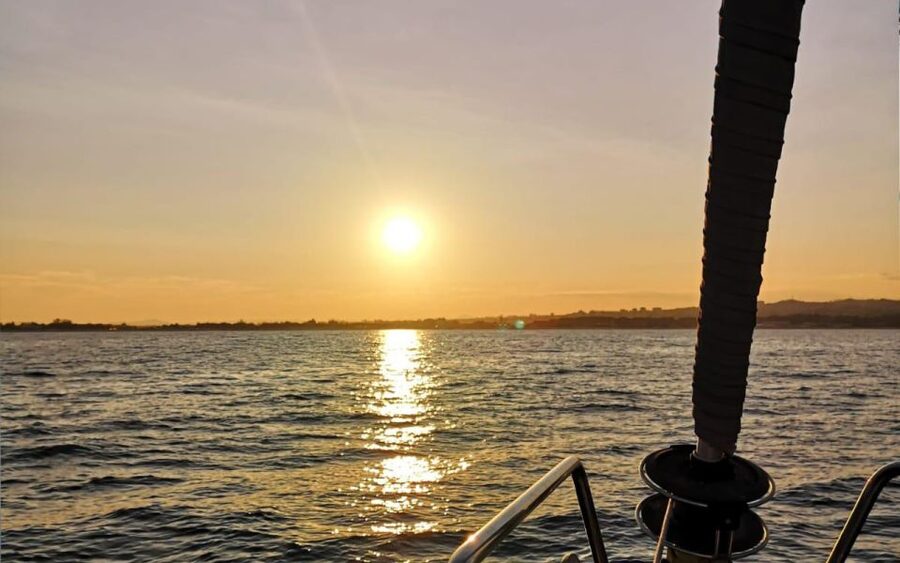 Catania: Guided Sunset Sailing Trip with Aperitif & Prosecco - Ulysses Caves Stop: Swim or Watch the Sunset From Onboard
