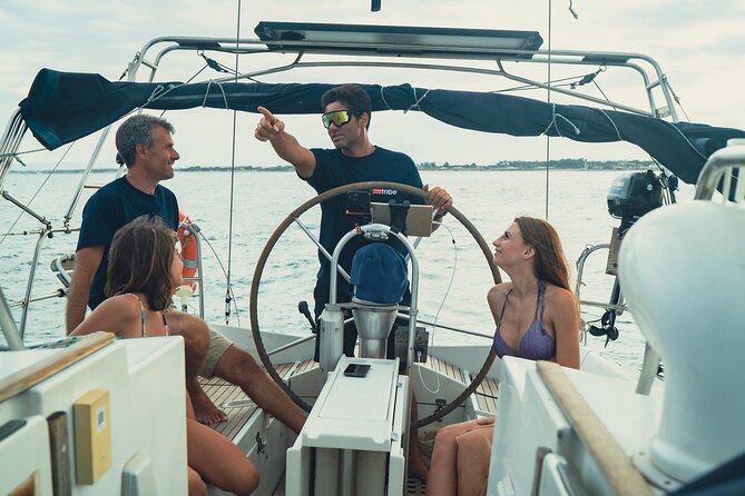 Catania: Sail Cyclops Coast by Boat and Enjoy a Sicilian Aperitif - Aci Trezza Faraglioni Swim Stop: When the Coast Turns Into Water Time