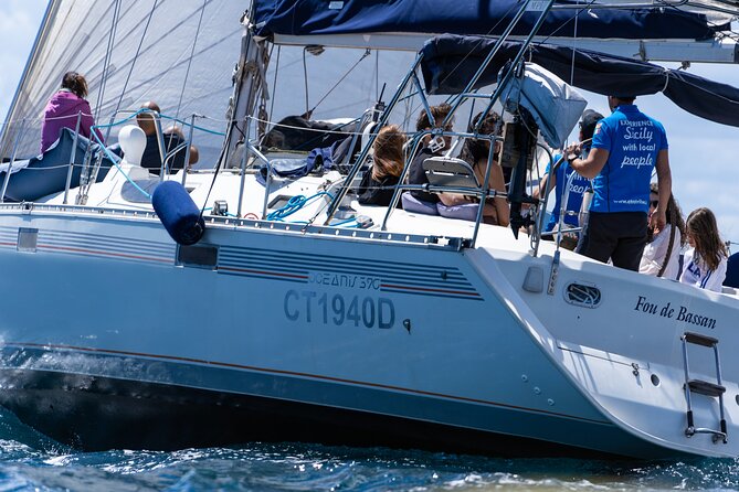 Catania: Sail Cyclops Coast by Boat and Enjoy a Sicilian Aperitif - Snorkeling, SUP, and Getting Wet Without Stress