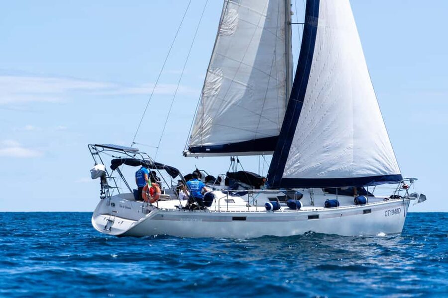 Catania: Sail Tour of Cyclops Coast with Sicilian Aperitif - The Sicilian aperitif hour: sparkling wine and local bites onboard