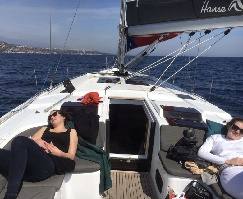 Catania: Spritz and Sunset Sailing Tour - Aci Trezza aperitif hour: beer, wine, and local snacks
