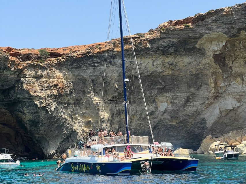 Comino: Blue Lagoon Catamaran Cruise with Lunch and Open Bar - How the day really works: weather-dependent swim stops