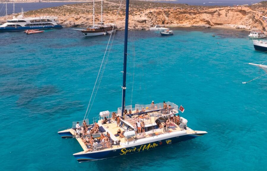 Comino: Blue Lagoon Catamaran Cruise with Lunch and Open Bar - The music and party vibe: chill sailing, then a dance session