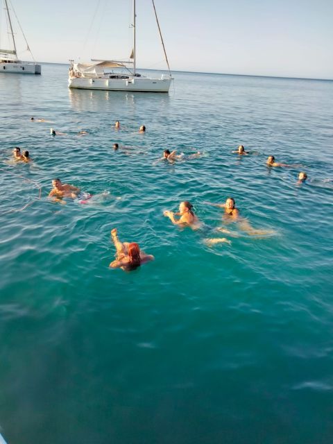 Denia: Cova Tallada Catamaran Tour and Swimming Stop - Denia–Cova Tallada by Catamaran: The 2 Hours That Make Sense