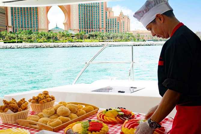 Dubai Marina Yacht Tour with Optional Breakfast or BBQ - Burj Al Arab photo stop: sail-shaped luxury from the waterline