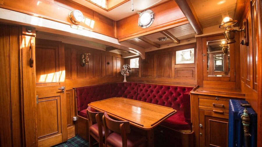 Evening Champagne Cruise on Historic 1935 Motor Yacht. - Getting to Te Anau’s historic wharf and settling in