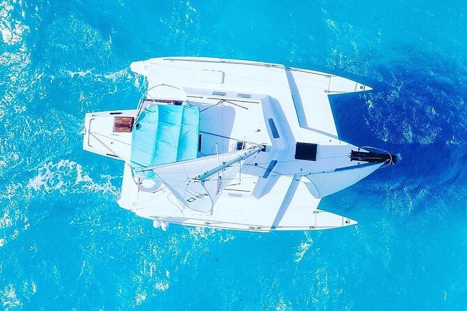 Exciting Catamaran Tour to Isla Mujeres, from Cancún! - Snorkeling Off Isla Mujeres: Gear Included, Water Time Tight