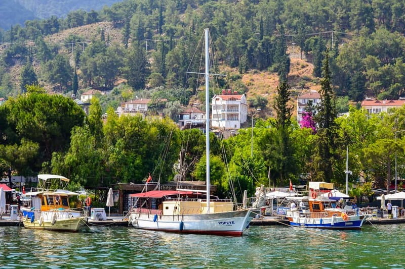 Fethiye: Island Sailing Trip with Lunch and Hotel Pickup - Cavy Bay: clear water and the rock-and-cave feel