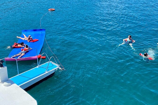 Flamingo Family Fun Catamaran Snorkel:Comfortable shaded seating - The Sunset Return Through Evening Breeze