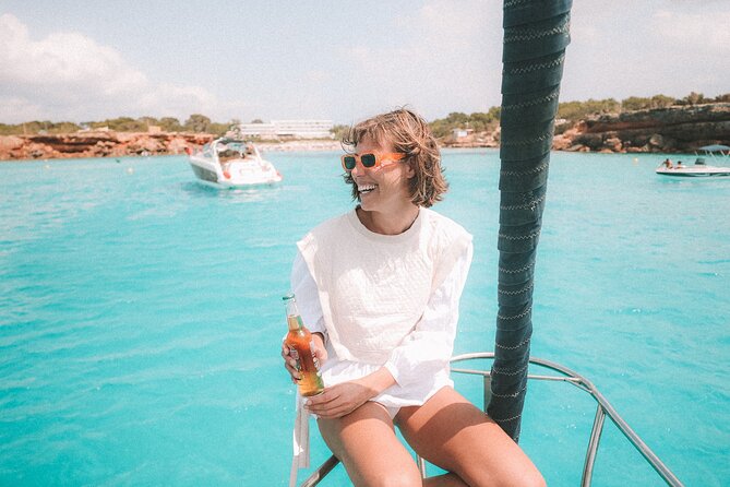 Formentera & Espalmador: Full-Day Private Sailboat Trip - Stop 4: Es Pujols bay protection, paddling comfort, and cliff-jump options