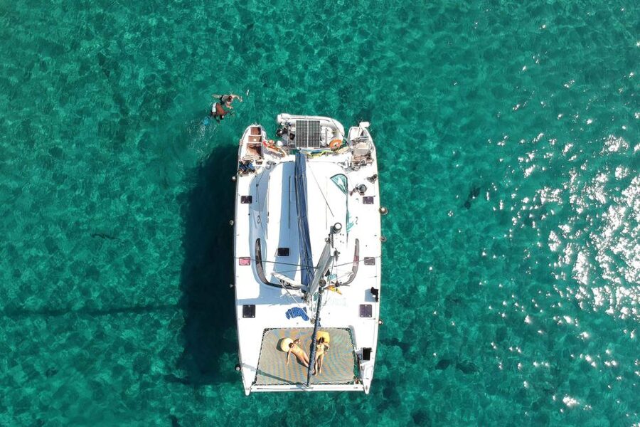 From Adamas: Milos and Poliegos Catamaran Cruise with Lunch - Gerakas Beach Swim Time with Snacks and Open Bar Perks