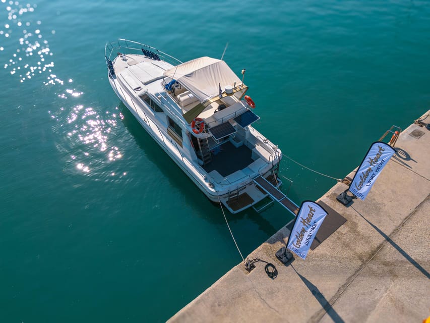 From Corfu: Luxury Yacht Cruise to Paxos and Antipaxos - Lakka Beach: a scenic warm-up before the dramatic coast