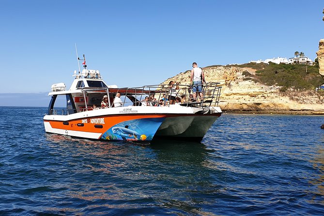 From Lagos: Benagil Caves Cruise on a Catamaran - Boat setup, seating, and the crowd reality at the cave