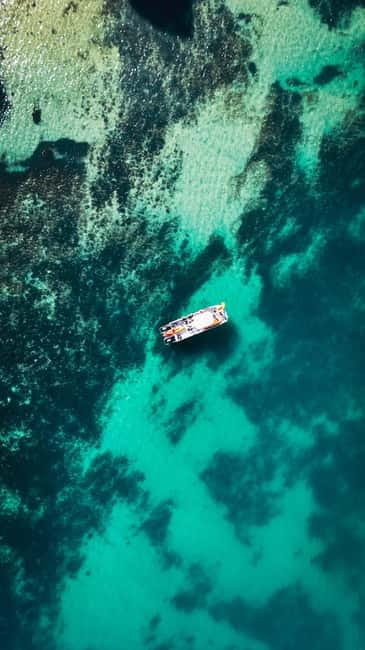 From Lagos: Ponta da Piedade Caves Kayak Tour from Catamaran - The catamaran ride: comfort first, then the fun starts