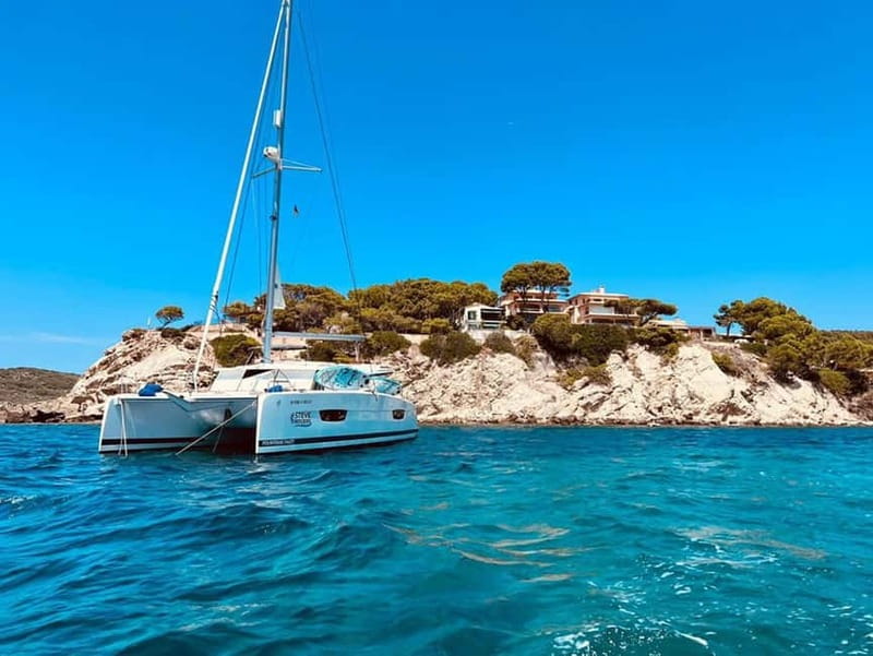 From Palma: Luxury Catamaran Group Tour with Tapas & Drinks - 4-hour daytime plan: sail out, anchor in a bay, then live in the water