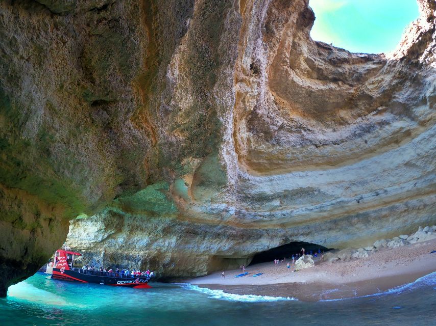 From Portimão: 2-Hour Catamaran Tour to Benagil Caves - Praia da Marinha swim stop (about 10 minutes): refreshing water near the arches