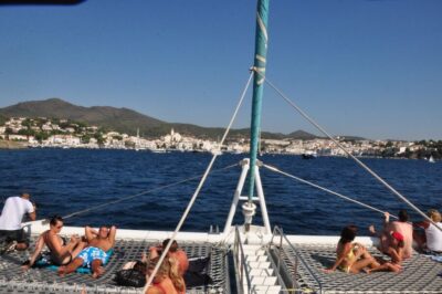 From Roses: Catamaran Cruise Cap Norfeu - Cadaqués - Racó de l’Home Cove: Swim, Snorkel, and Relax in Bow Nets