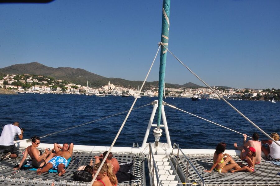 From Roses: Catamaran Cruise Cap Norfeu - Cadaqués - Racó de l’Home Cove: Swim, Snorkel, and Relax in Bow Nets