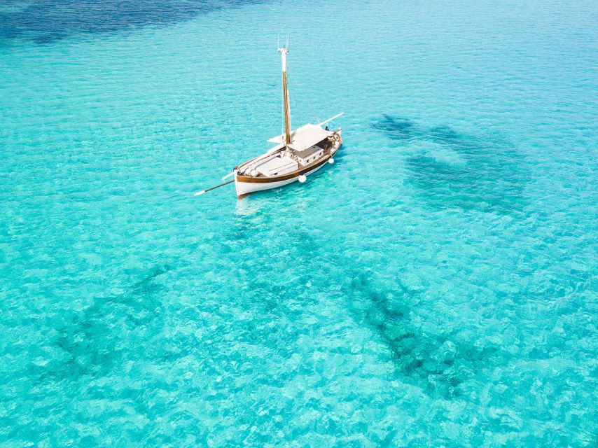 From Stintino: Asinara Vintage Sailing Boat Tour with Lunch - Cala d’Oliva and Sa Murighessa: White Sand, Prison-Beach Lore, and the Park HQ
