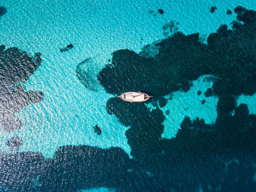 From Stintino: Asinara Vintage Sailing Boat Tour with Lunch - Stintino Morning: Finding the Boat and Setting Yourself Up
