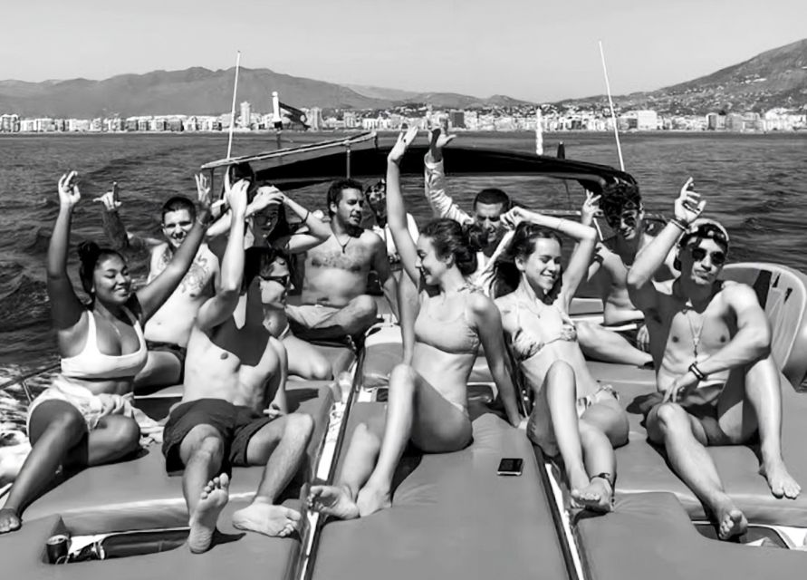 Fuengirola: Dolphin Watching by Yacht with Snacks and Drinks - The Coastline Views: Calaburras Lighthouse and Torrequebrada Beach