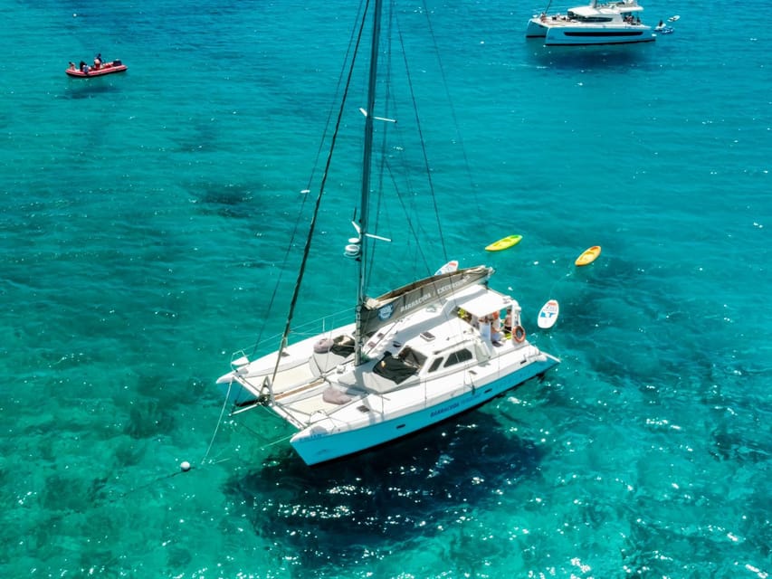 Fuerteventura : Catamaran excursion to Lobos Island - La Concha Beach Stop: Snorkeling, Kayaking, and Paddleboarding Freedom